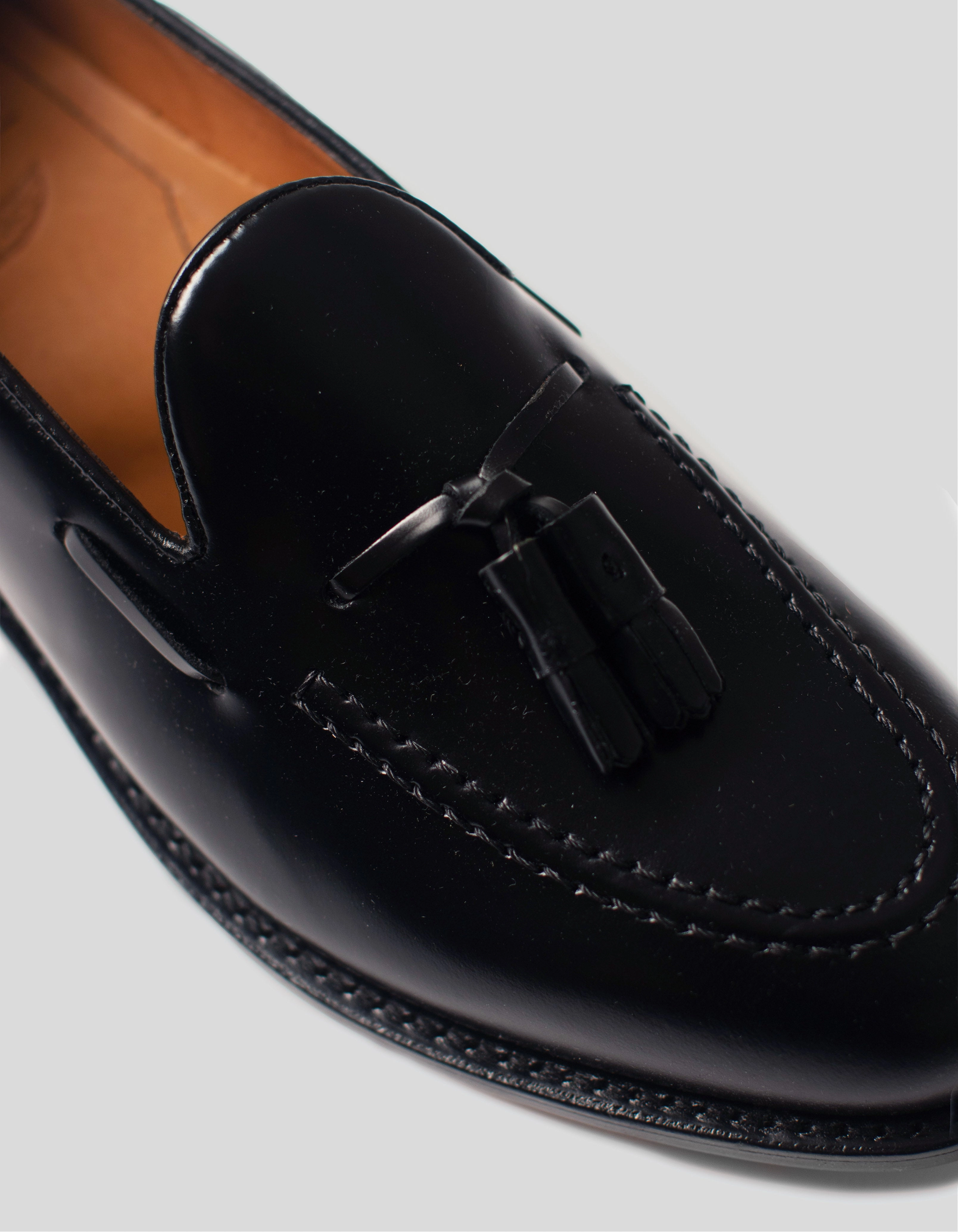 SEBAGO BLACK TASSLE SLIP ON
